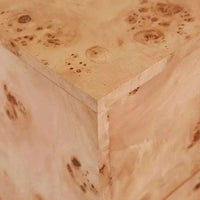 Close-up of light burl veneer texture on Trove Burl Bedside Table corner with natural grain patterns