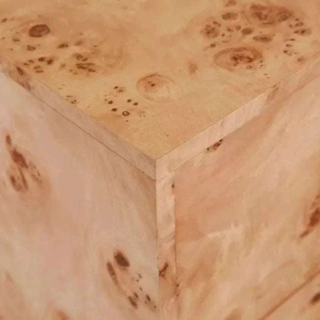 Close-up of light burl veneer texture on Trove Burl Bedside Table corner with natural grain patterns
