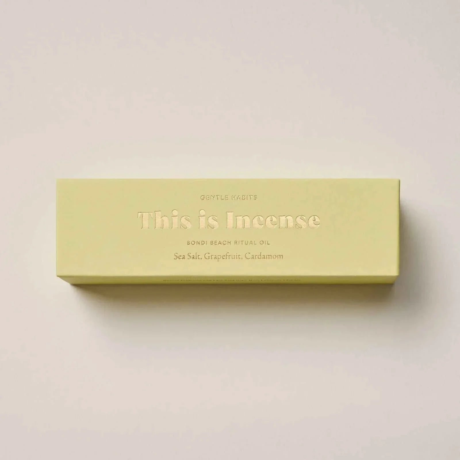 Gentle Habits diffuser oils This Is Incense Bondi Beach ritual oil with sea salt, grapefruit, and cardamom scent in a pale green box