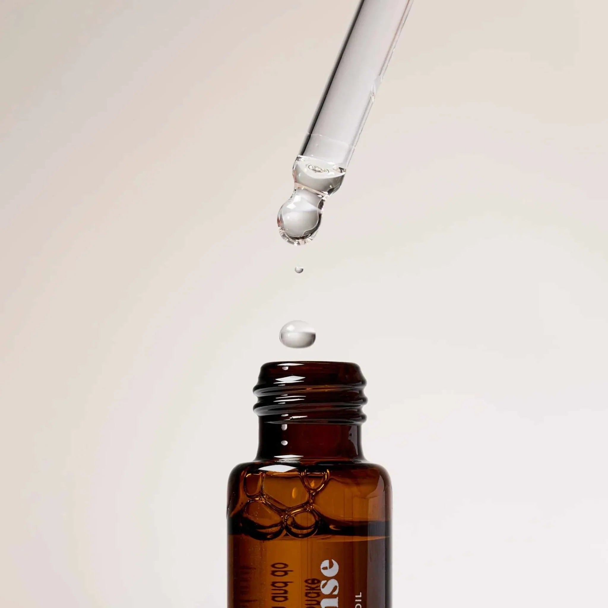 Gentle Habits collection Byron Bay Ritual Diffuser Oil bottle with dropper releasing oil drop above it