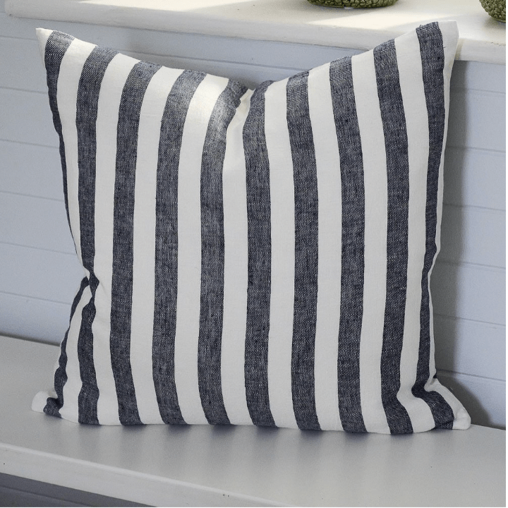 Eadie Lifestyle Santi Linen cushion with white and navy wide stripes, 100% linen fabric, plump feather insert, OEKO-TEX and GOTS certified.