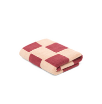 Folded Loop Home Bath Mat in Ruby and Almond Blush brick pattern made of organic cotton