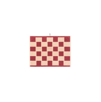 Loop Home Bath Mat in ruby and almond blush with brick checkerboard design, made of organic cotton jacquard weave, 80x60 cm