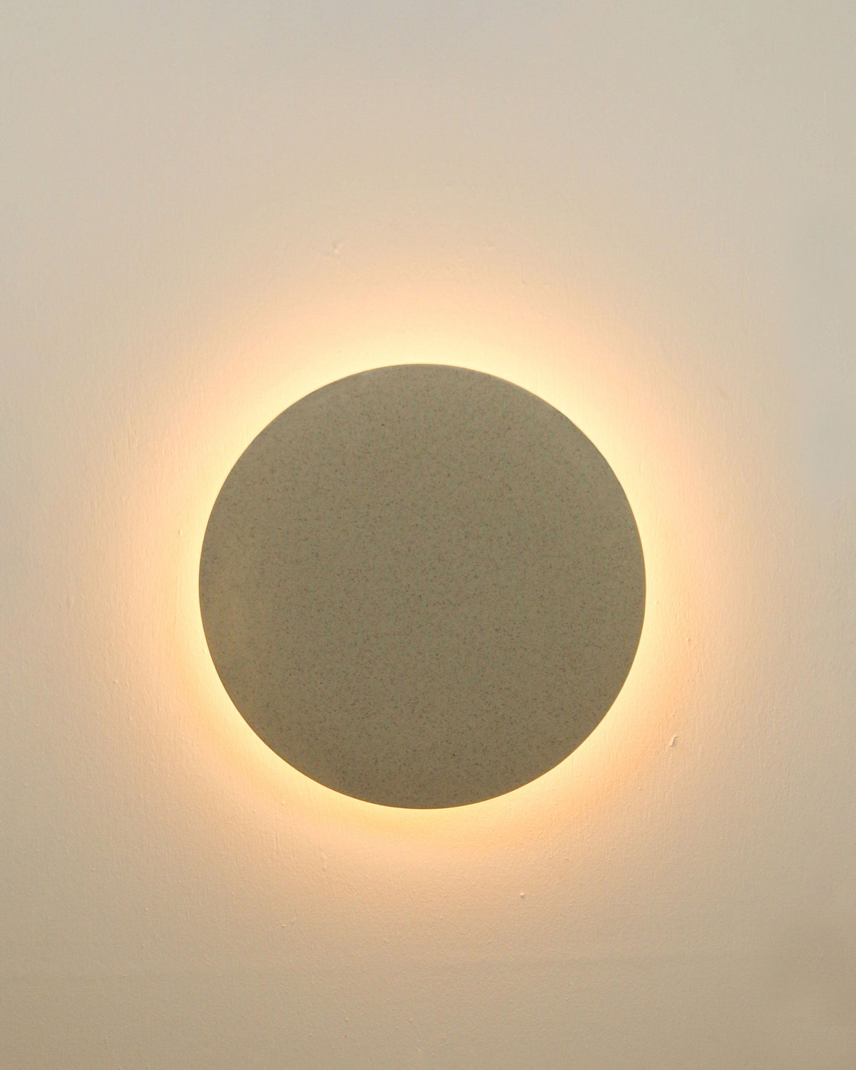 Robert Gordon Backlit Disc Wall Light in Stone