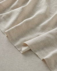 Close up of the Savanna pinstripe weave in Sova pure linen