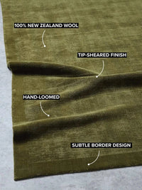 Tribe Home Tait Rug in olive green hand-loomed New Zealand wool with tip-sheared texture