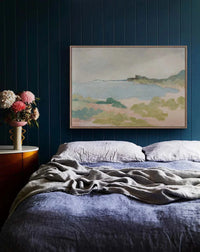 Marcia Priestley limited edition fine art canvas print The Briny I in floating oak frame above bed in blue bedroom setting