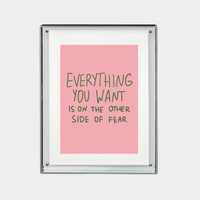 motivational digital print with quote everything you want is on the other side of fear on pink background in frame
