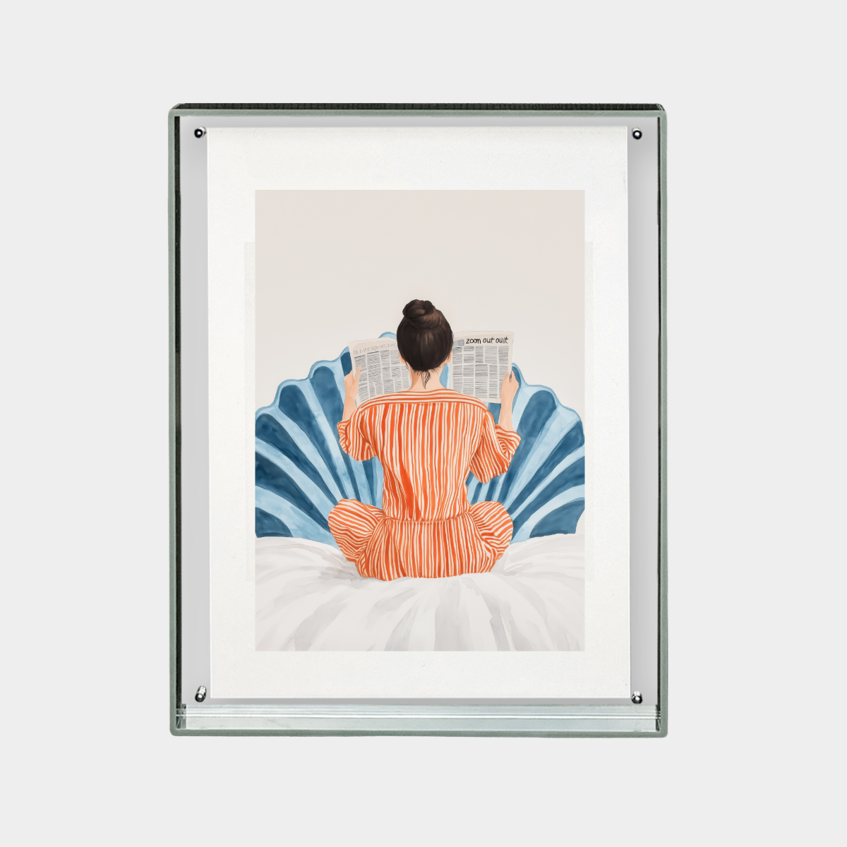 Framed digital print of person in orange pajamas reading newspaper on bed against blue decorative background