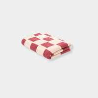 Folded Loop Home Bath Sheet in ruby and almond blush brick checkered pattern made from organic cotton with jacquard weave.