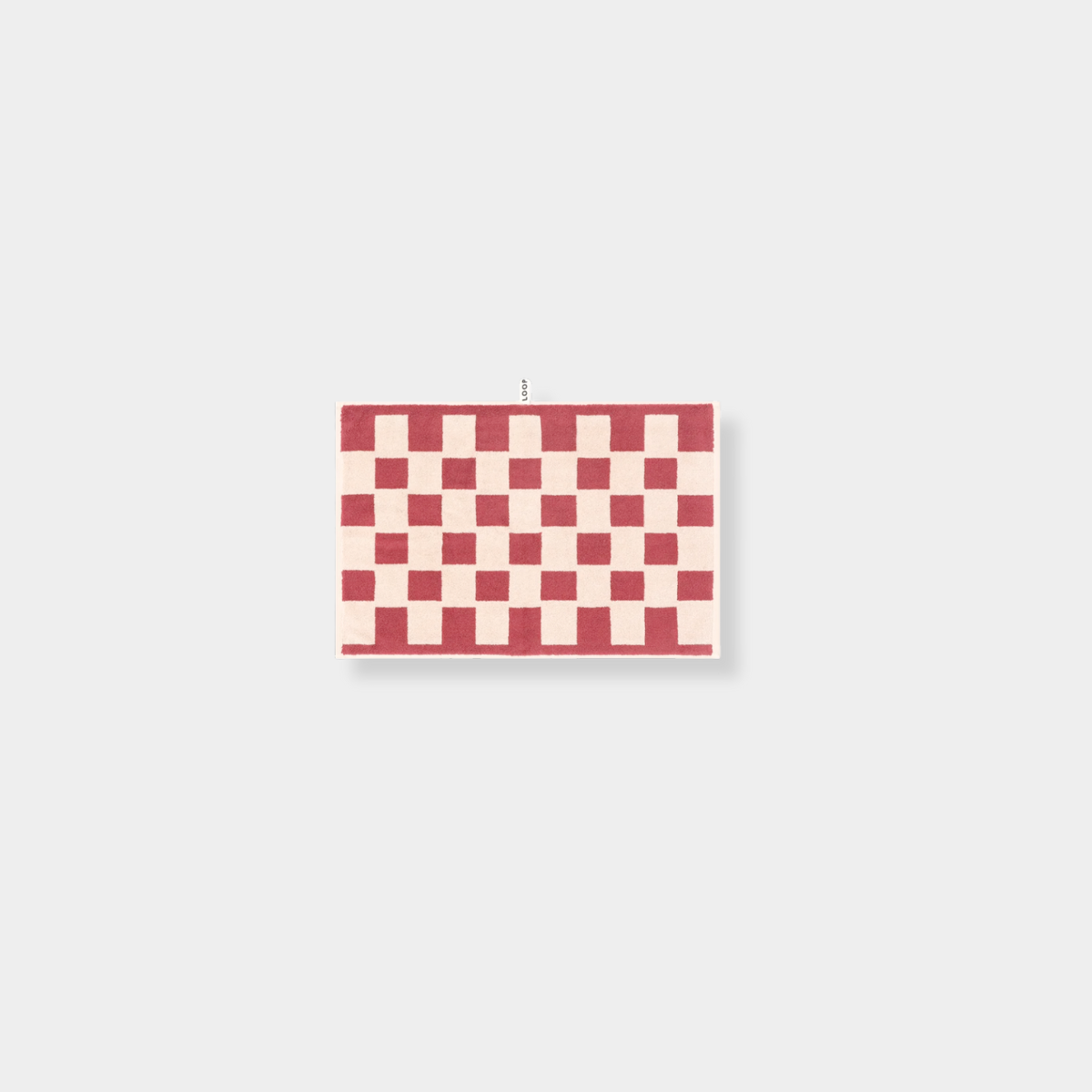 Loop Home Hand Towel in ruby and almond blush brick checkered organic cotton design
