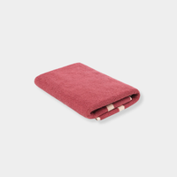 Loop Home Bath Mat in Ruby and Almond Blush pinstripe made from organic cotton with jacquard weave, 80x60 cm size