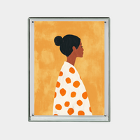 digital print of a stylized woman in profile with black hair bun and white dress with orange polka dots on an orange background