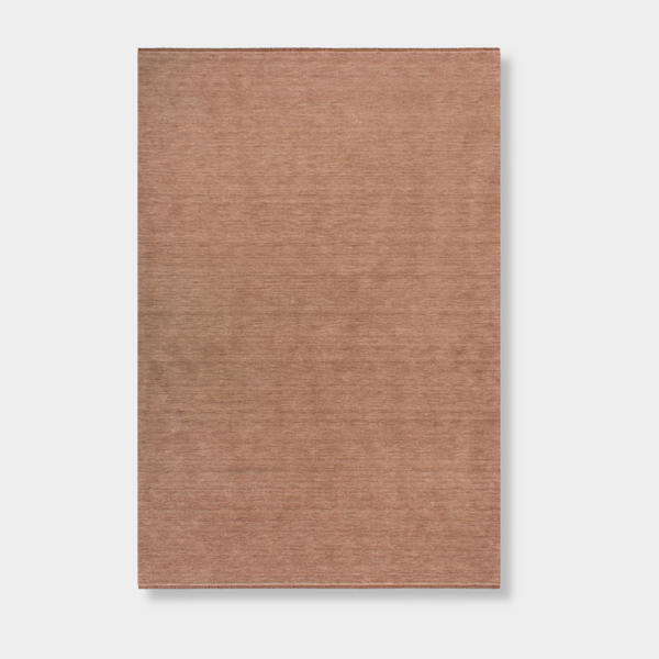 Baya Sandringham Floor Rug in rosewood pink, hand-knotted 100% NZ wool with dense loop pile and delicate fringing, rectangular shape.
