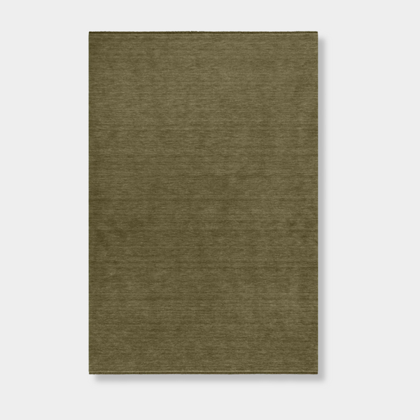 Baya Sandringham Floor Rug in basil green, hand-knotted 100% NZ wool with a soft, dense pile and delicate fringes.