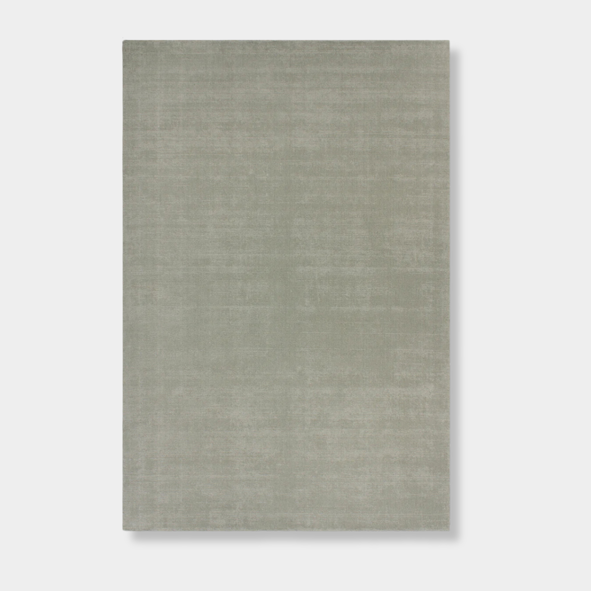 Baya Haywood Floor Rug in slate with soft sage-green undertones, made of 100% New Zealand wool with a knotted tip shear pile for a luxurious texture