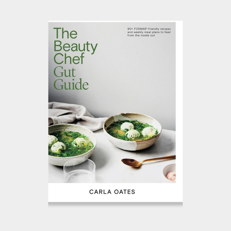 The Beauty Chef Gut Guide book by Carla Oates with green soup bowls on cover