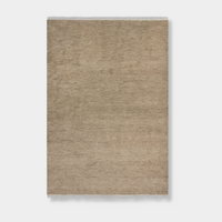 Baya Tanami Floor Rug in natural taupe with hand-knotted texture and soft cotton fringe, made from 100% New Zealand wool