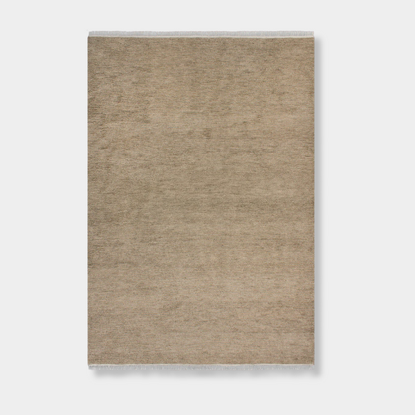 Baya Tanami Floor Rug in natural taupe with hand-knotted texture and soft cotton fringe, made from 100% New Zealand wool