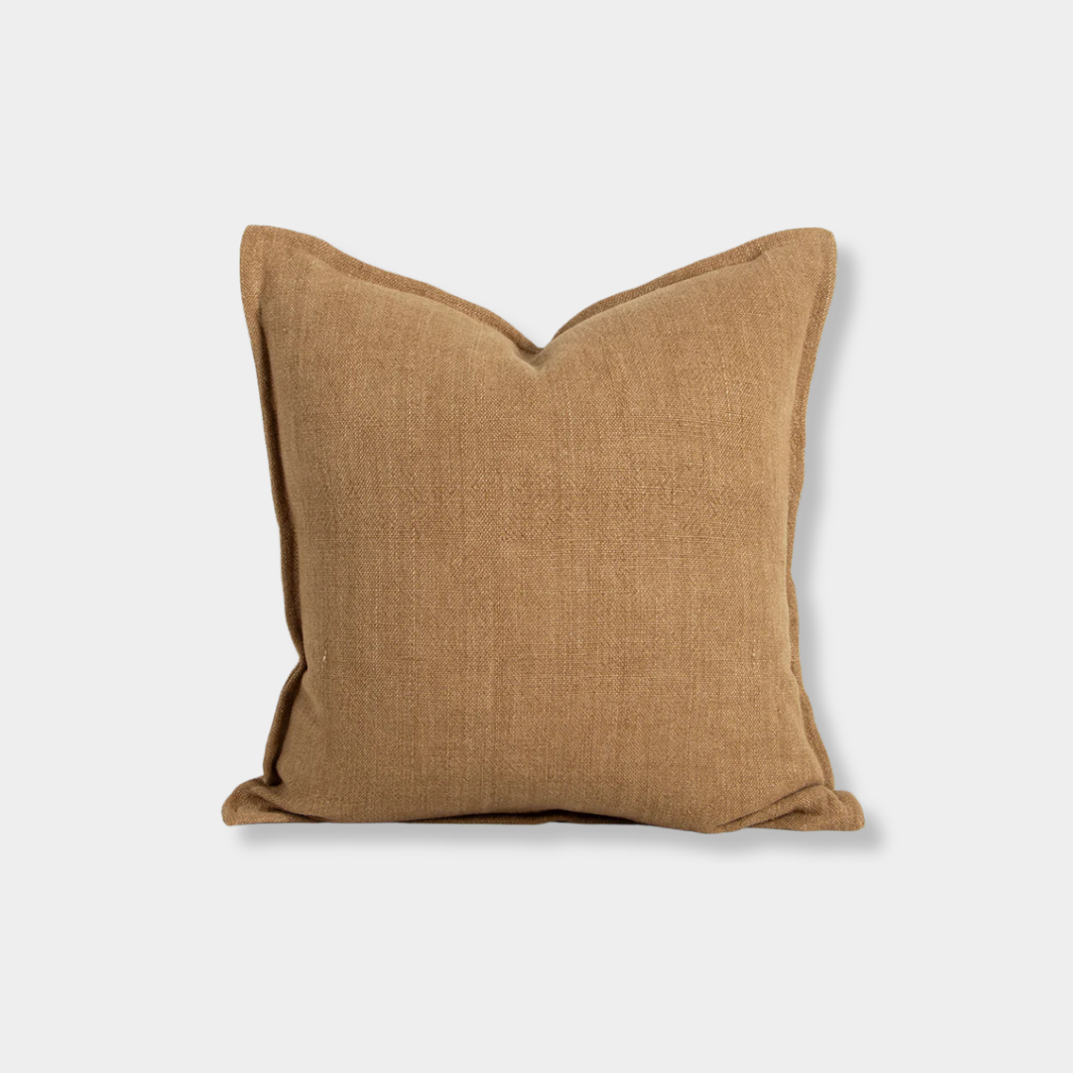 Baya Flaxmill Cushion in fenugreek color with 100% linen heavyweight weave, flange edge, and plush feather insert, measuring 50x50 cm.