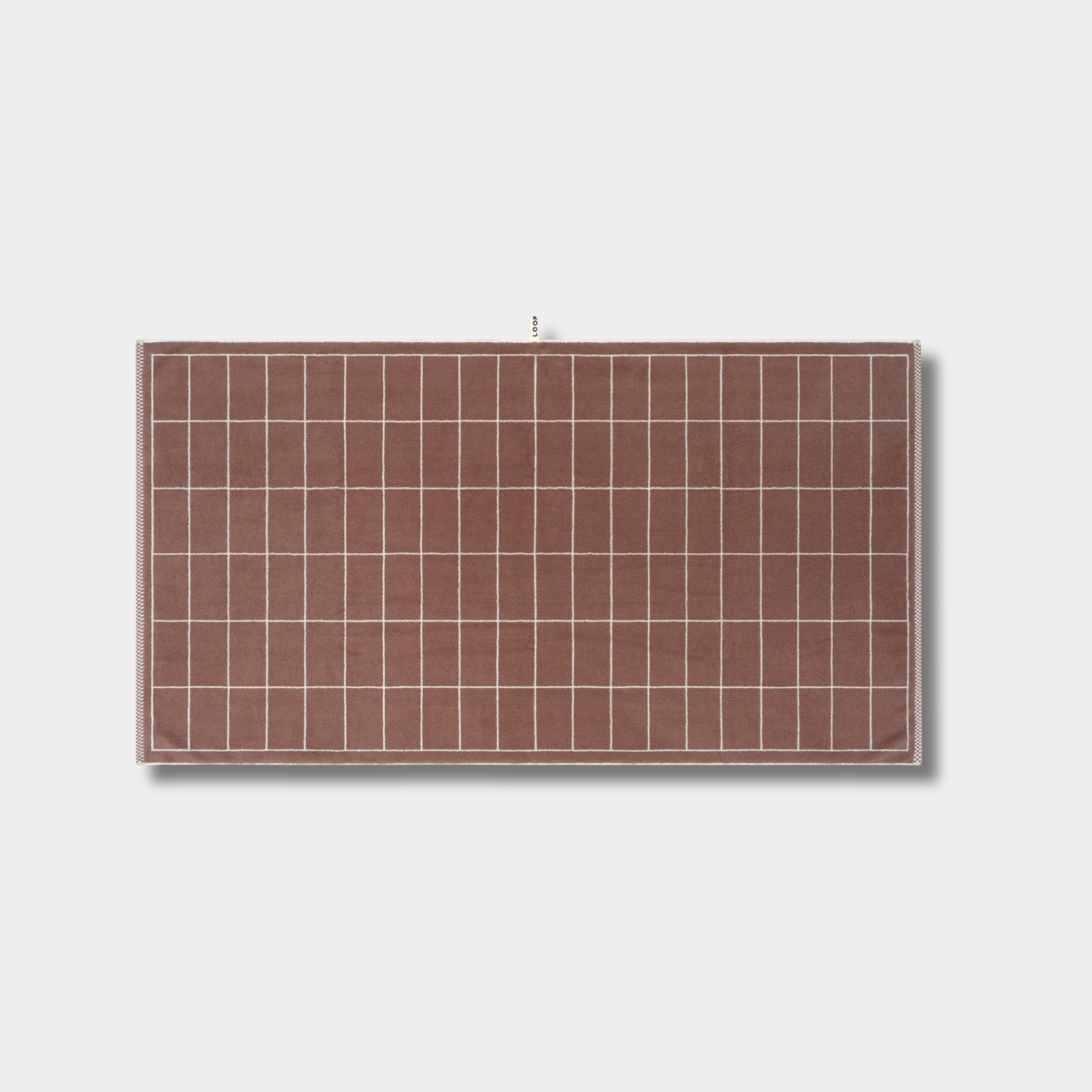 Loop Home Bath Towel in coffee and ivory with tile pattern made from organic cotton, jacquard weave, 140x70cm