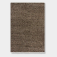 Baya Tanami Floor Rug in earthy brown, hand-knotted 100% New Zealand wool with soft cotton fringe, low-profile design