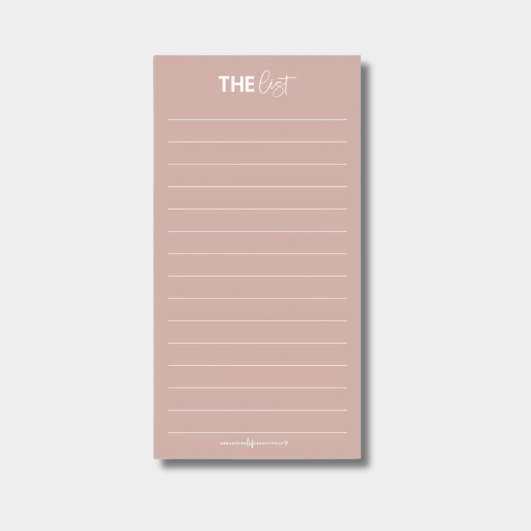 Blush reusable fridge shopping and to-do list with magnetic backing and lined whiteboard surface.