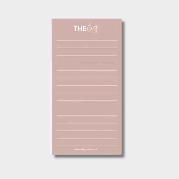 Blush reusable fridge shopping and to-do list with magnetic backing and lined whiteboard surface.