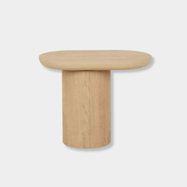 Globe West Seb Pedestal Side Table in natural oak with narrow oval top and cantilever design