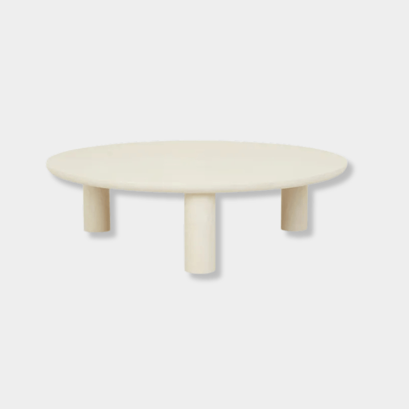 GlobeWest Seb Round Coffee Table with rope-colored claylime finish and three chubby pillar legs, modern low-profile design