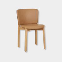GlobeWest Sketch Pinta Dining Chair with pecan leather upholstery and light oak solid oak frame, modern curved backrest design.
