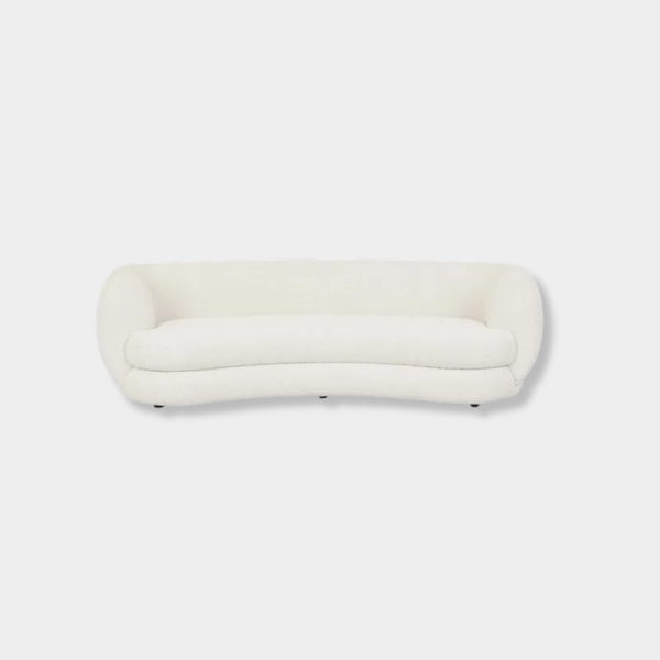 GlobeWest Hugo Vera 4 seater sofa in oat boucle with rounded edges and plush cushioning.
