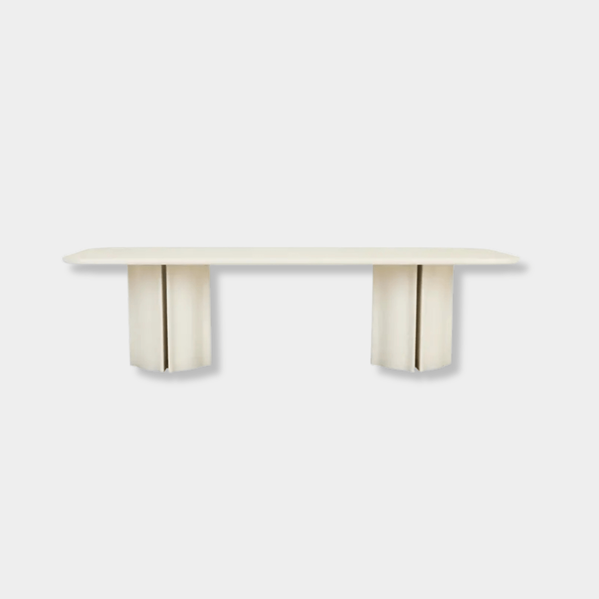 GlobeWest Leon Dining Table in porcelain with sculptural fluted pillar legs and rounded corners, seating up to 10.