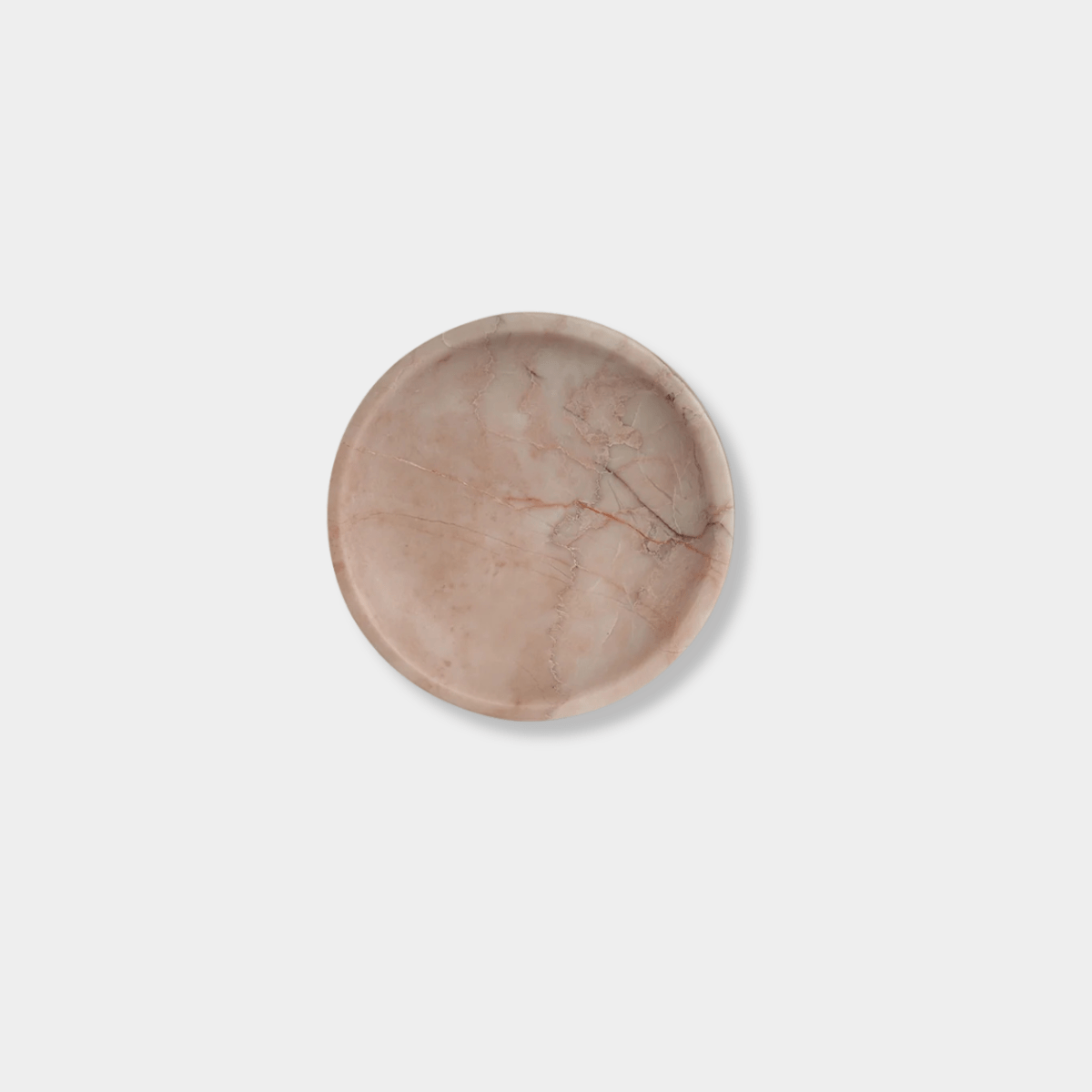 Black Blaze Linea small round marble dish in rosa with smooth edges, 100mm diameter, elegant and versatile for serving or display.