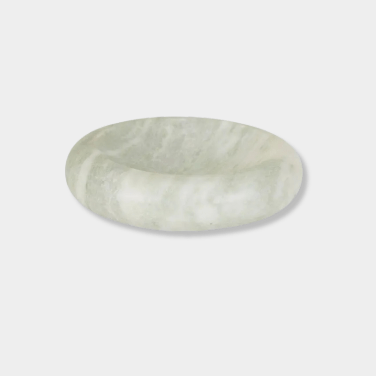 GlobeWest Rufus Indra Bowl in polished green onyx marble with rounded elevated design, handcrafted indoor decor.