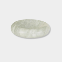 GlobeWest Rufus Indra Bowl in polished green onyx marble with rounded elevated design, handcrafted indoor decor.
