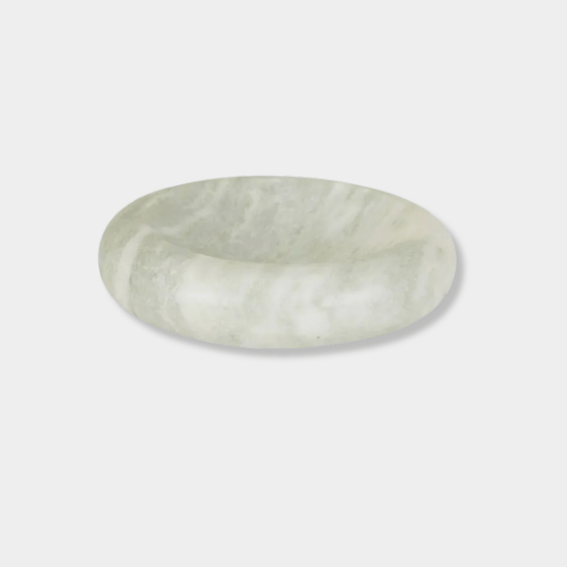 GlobeWest Rufus Indra Bowl in polished green onyx marble with rounded elevated design, handcrafted indoor decor.