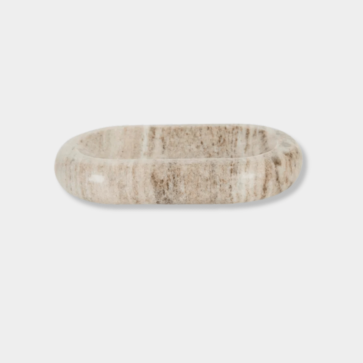 GlobeWest Rufus Indra pill shallow bowl in polished oat marble with organic veining and modern rounded design