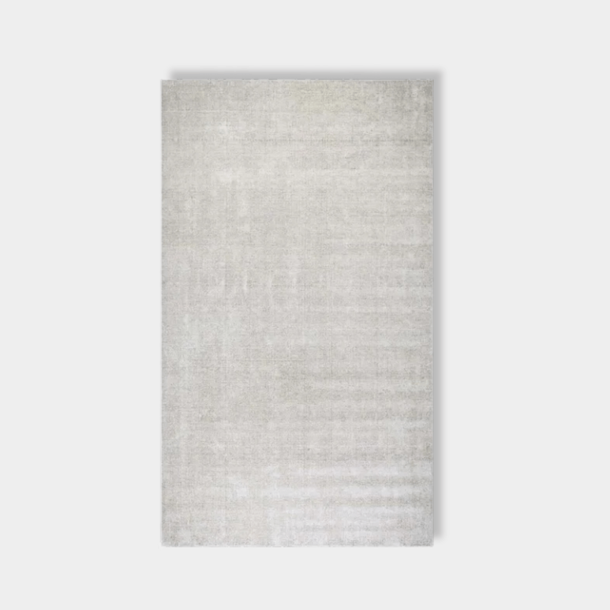 GlobeWest Tepih Neptune hand-woven seashell wool blend indoor rug with subtle rustic texture