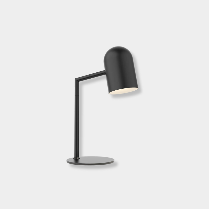 Black Pia Desk Lamp with modern architectural design on a desk