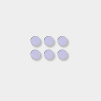Set of six lilac Mustard Made magnetic buttons with smooth flat surface and shiny edges.