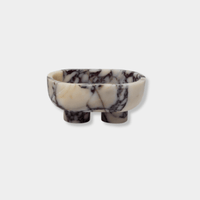 CoTheory Marble Footed Oval Tray in Viola Marble with sculptural stone design and unique black and white veining.