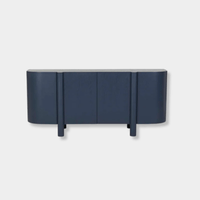 GlobeWest Artie Buffet in twilight blue with curved edges, four doors, slender legs, and spacious interior compartments