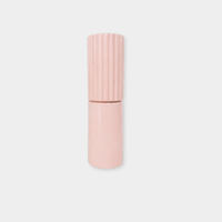 Pink norsu Studio salt and pepper grinder with rubber wood body and gloss finish