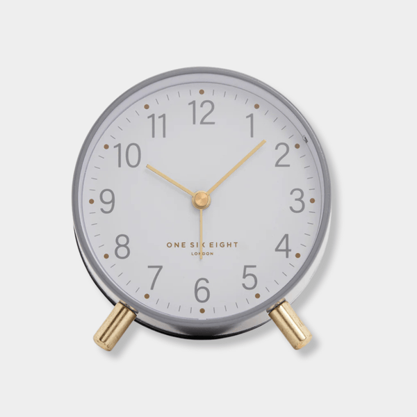 Maisie Silent Tick Alarm Clock in grey with gold hands and legs, vintage style with alarm and nightlight functions