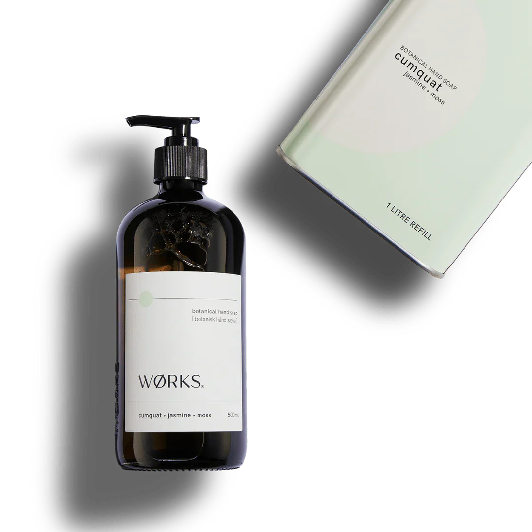 Works Hand Soap cumquat jasmine moss in refillable smoky grey glass bottle with pump dispenser and 1 litre refill pack
