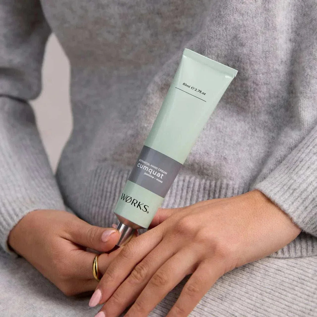 Works Hand Cream Tube in cumquat scent with aluminium packaging, moisturizing and fast-absorbing formula