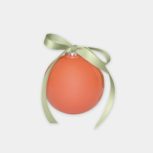 norsu STUDIO glass Christmas bauble in coral with velvet ribbon hanger