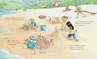 Children building intricate sandcastles on a sunny beach with seaweed, stones, and driftwood in Castle Crashing by Andrea Rowe