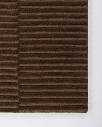 Baya Anni Floor Rug in chocolate with textured cut and looped wool pile design